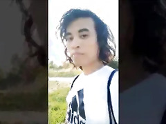 Cute Adidas boy walking in freeball (balls bare no panties under his shorts), wanking his cock, ejaculating his cum on the rock, pissing his pee in a public park