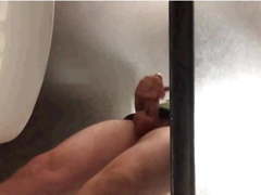 Caught jerking under stall spy voyeur