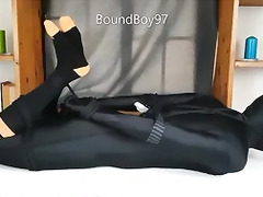 Lycra Guy hogtied on table.